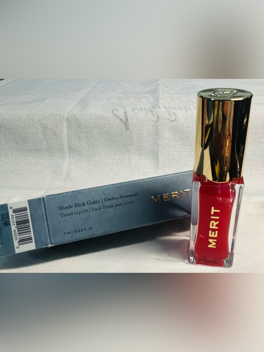 Merit Shade Slick Gelée Tinted Lip Oil — Shade Maraschino